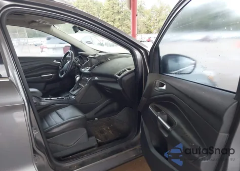 2014 Ford Escape Titanium z USA, uszkodzony, nr VIN 1FMCU9J92EUA69822